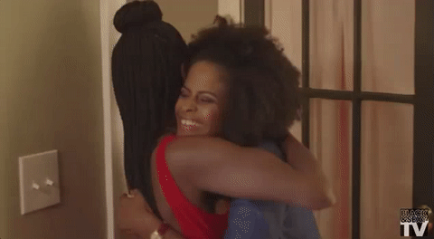 Black women hugging